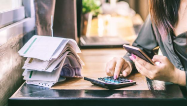 woman calculating expenses